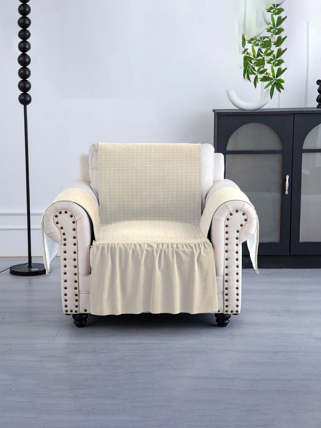 

Myntra Elegant Homes Cream-Coloured Velvet 1 Seater Sofa Cover With Arms