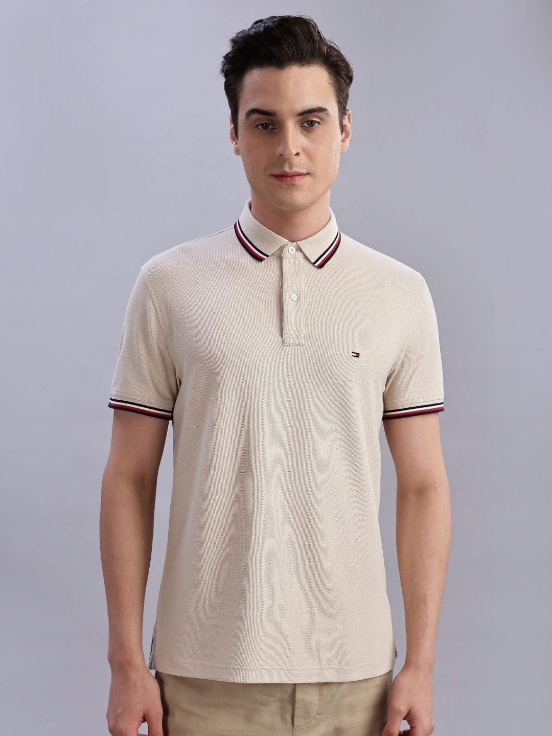 

Tommy Hilfiger Men Solid Polo Collar Cotton T-shirt, Beige