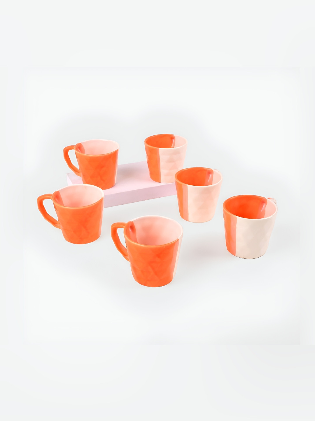 

Storepedia Orange & White 6 Piece Textured Ceramic Matte Cups Set of Cups and Mugs