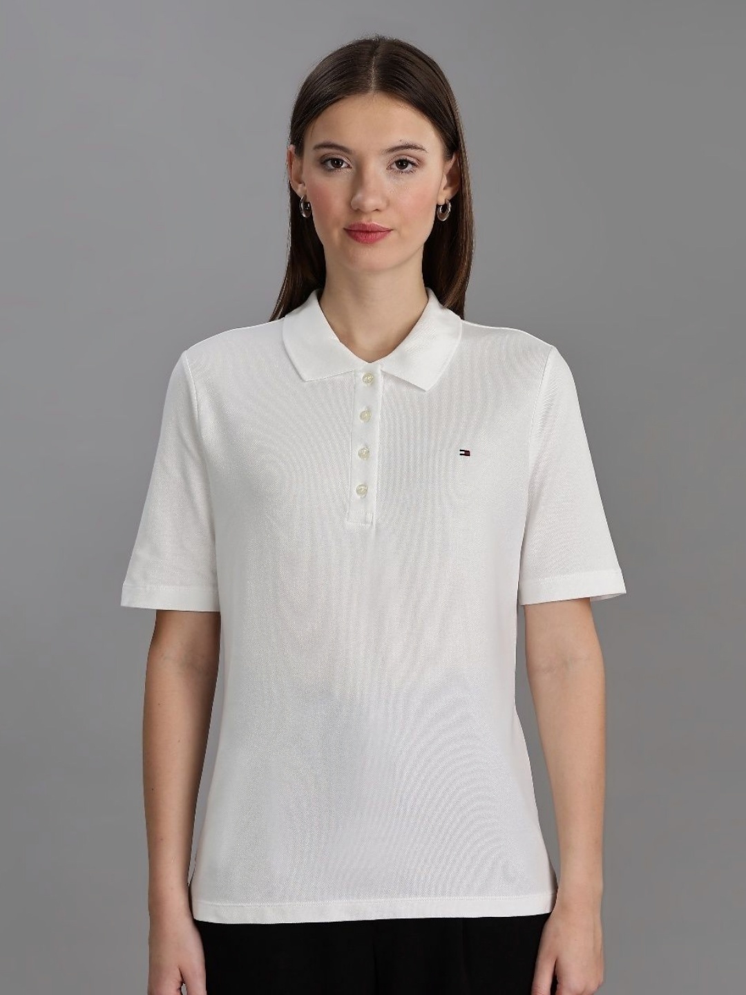 

Tommy Hilfiger Women Solid Polo Collar Cotton T-shirt, White