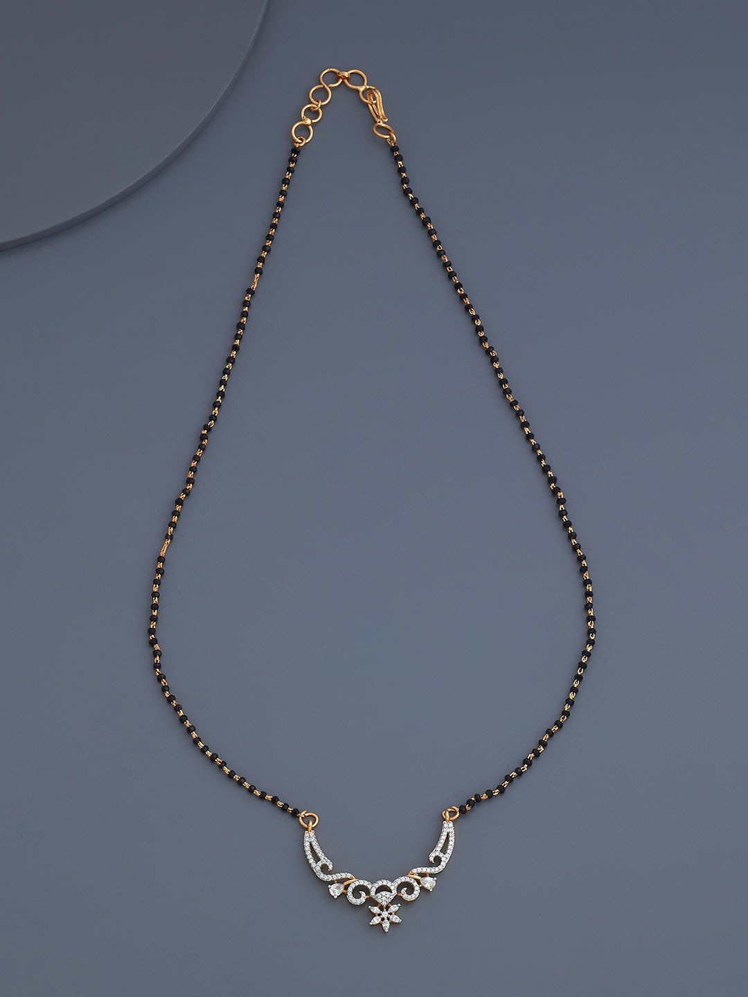 

Kushal's Fashion Jewellery Gold-Plated Zircon Studded & Beaded Mangalsutra
