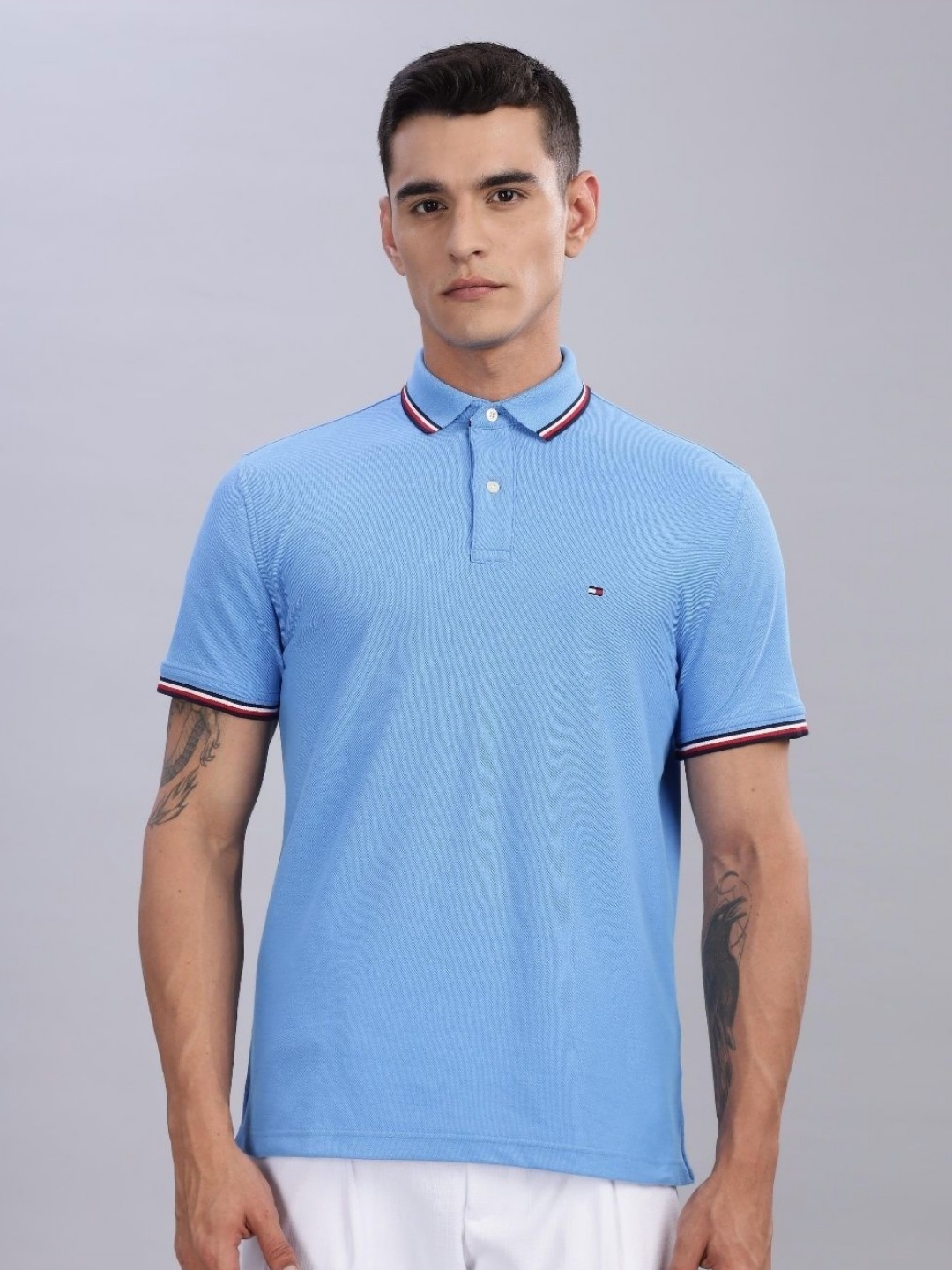 

Tommy Hilfiger Men Solid Polo Collar Cotton T-shirt, Blue