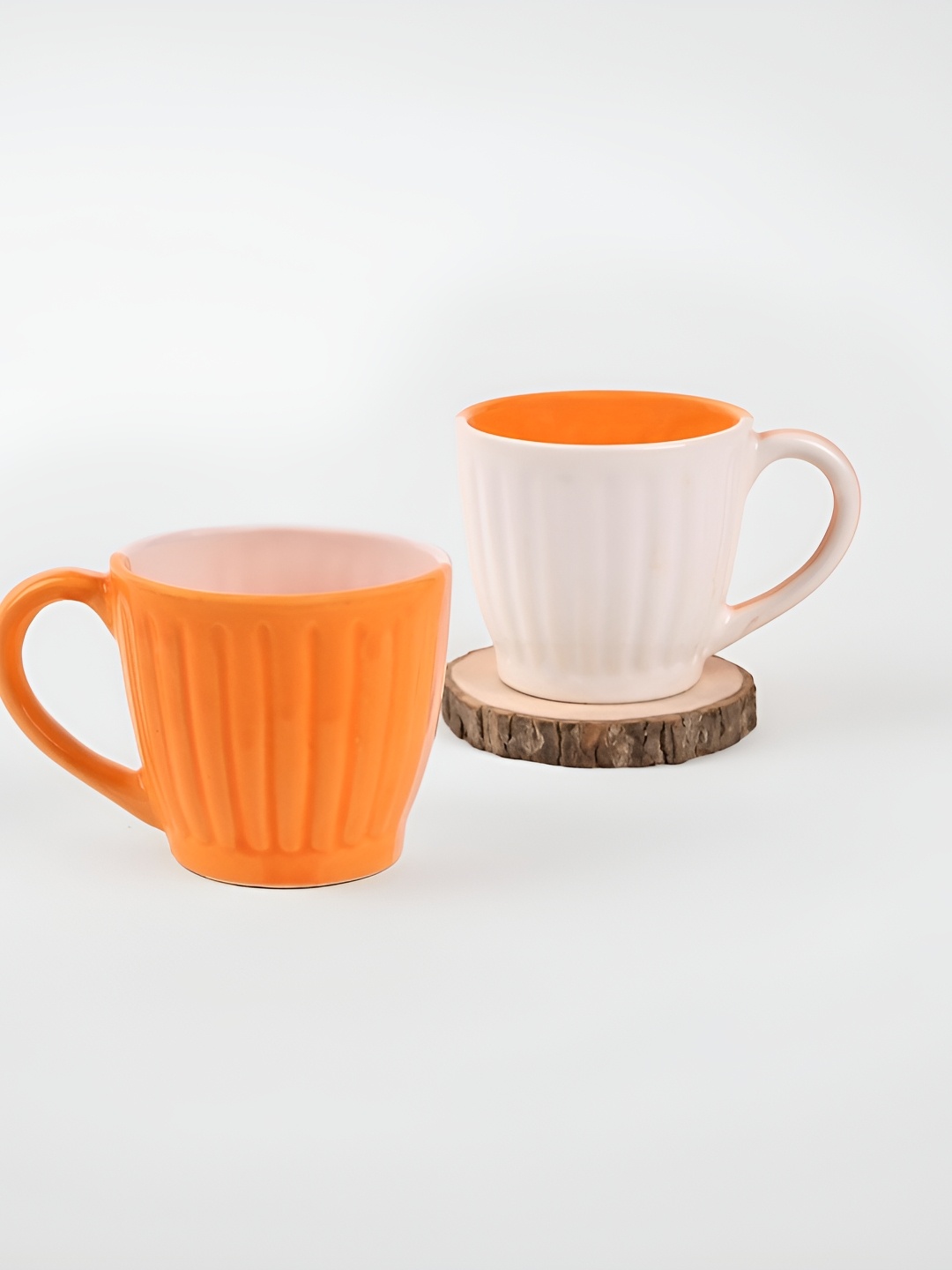 

Storepedia White & Yellow 2 Pieces Textured Ceramic Matte Cups 150ml Each