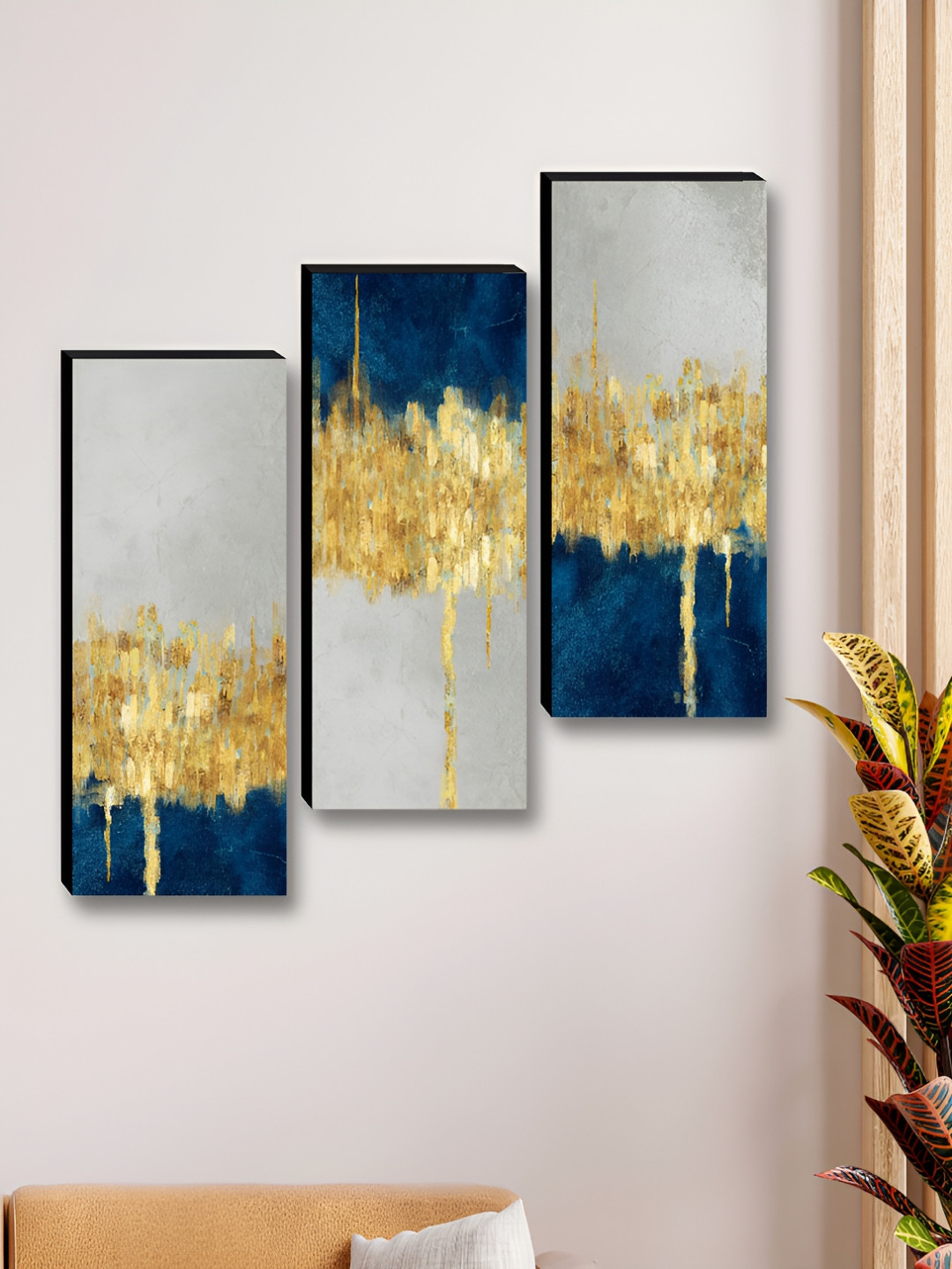 

Myntra Elegant Homes Blue & Gold-Toned 3 Pieces Abstract Printed Wooden Wall Paintings