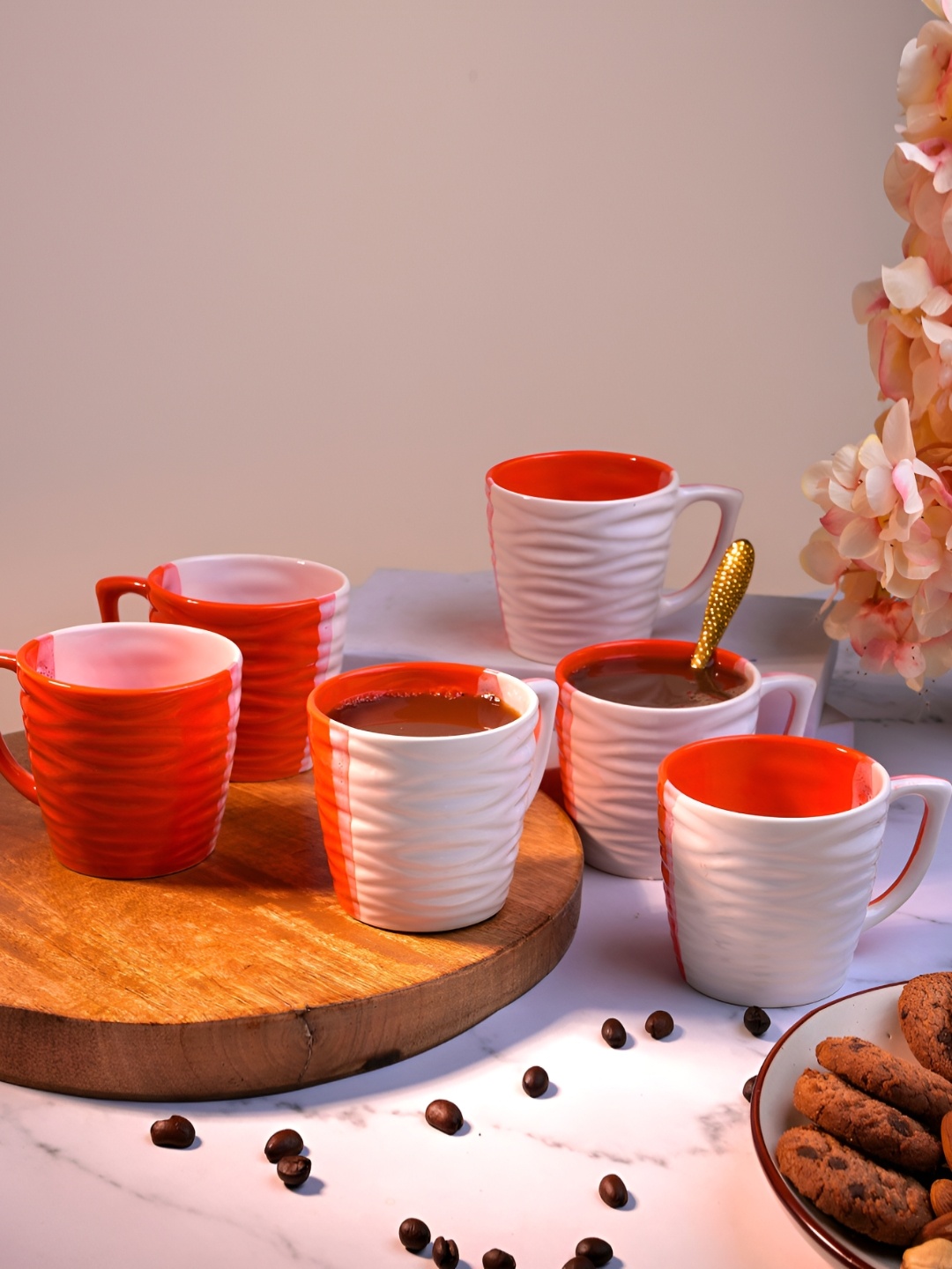 

Storepedia Orange & White 6 Pieces Textured Ceramic Matte Cups 150ml
