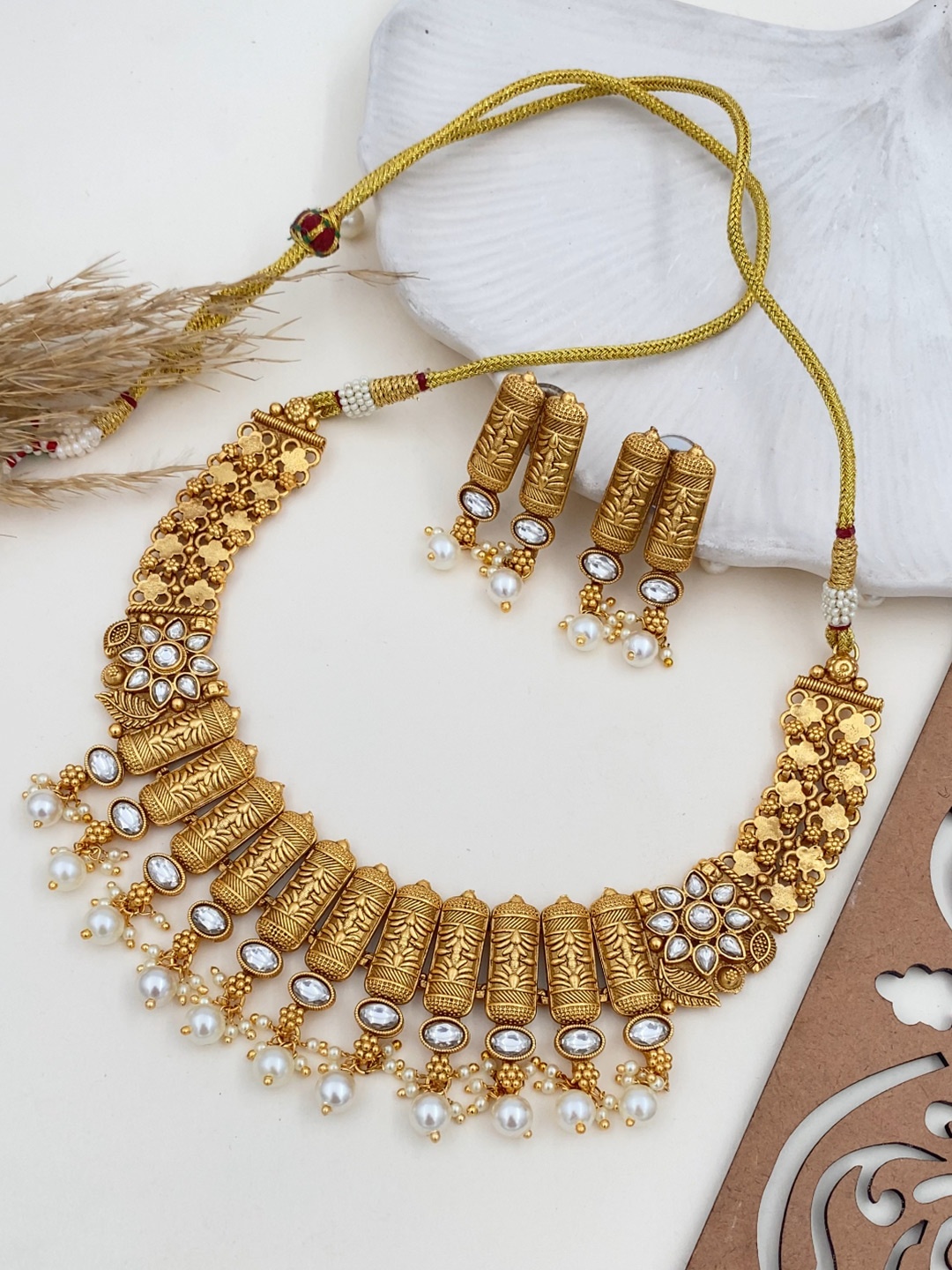 

Rare Bello Gold-Plated Kundan-Studded And Pearls Beaded Antique Jewellery Set