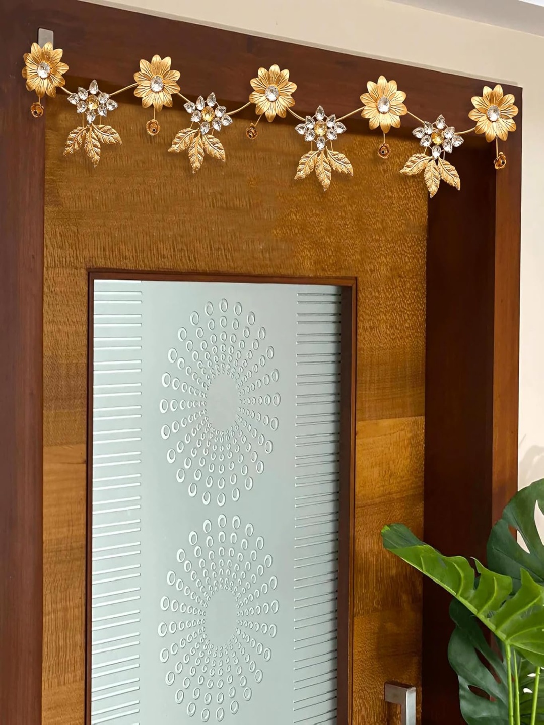 

THE HOME CO. Gold Toned Textured Metal Flower Hanging Toran Festive Decor