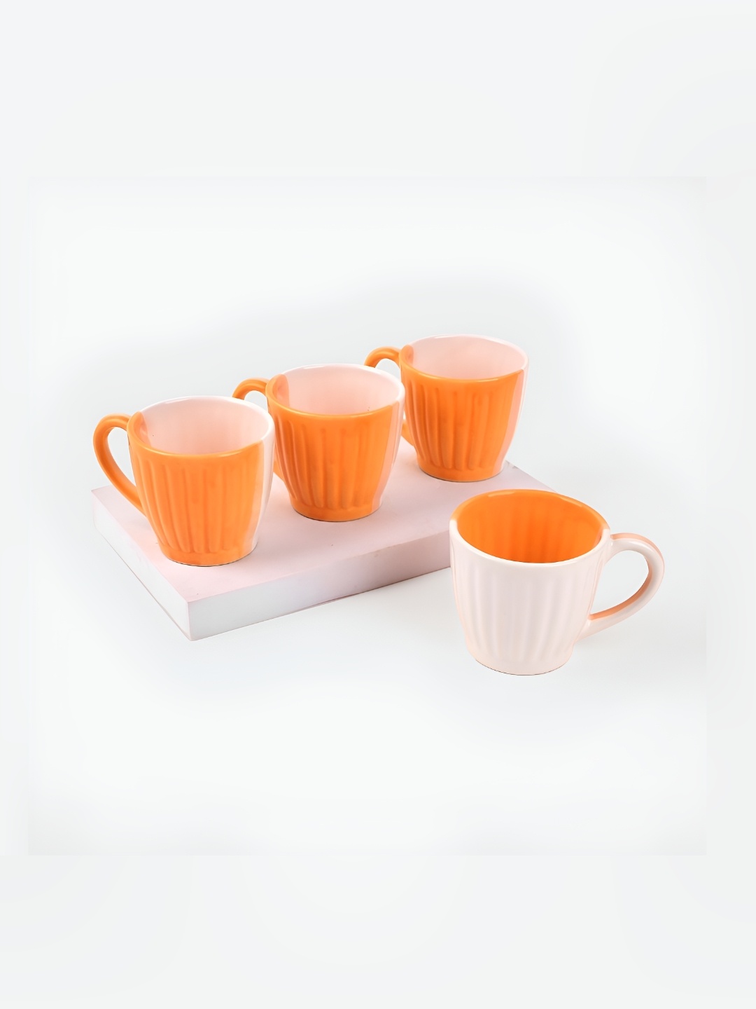

Storepedia Yellow & White 4 Pieces Textured Ceramic Matte Cups 150ml Each