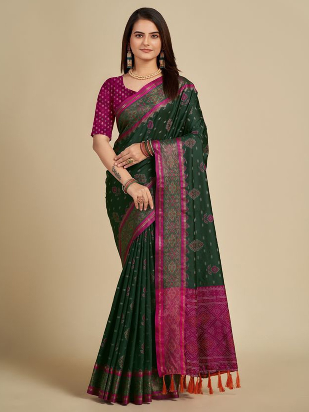 

Exclusiva Woven Design Zari Patola Saree, Green