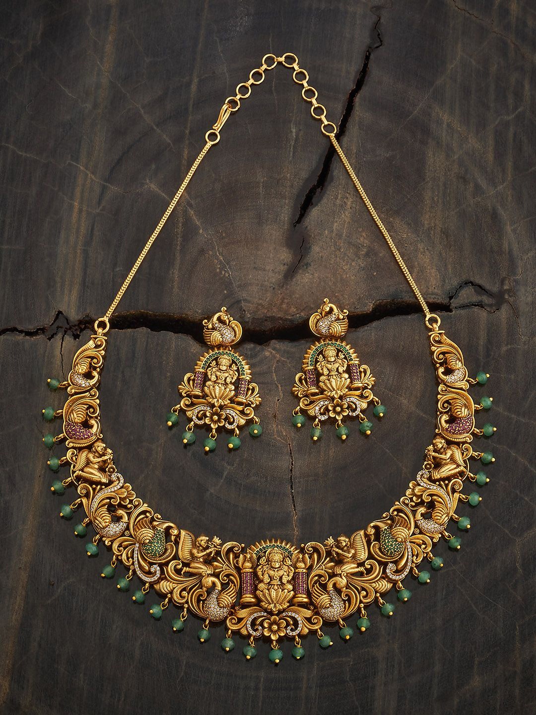 

Kushal's Fashion Jewellery Gold-Plated Ruby Studded Ethnic Antique Jewellery Set