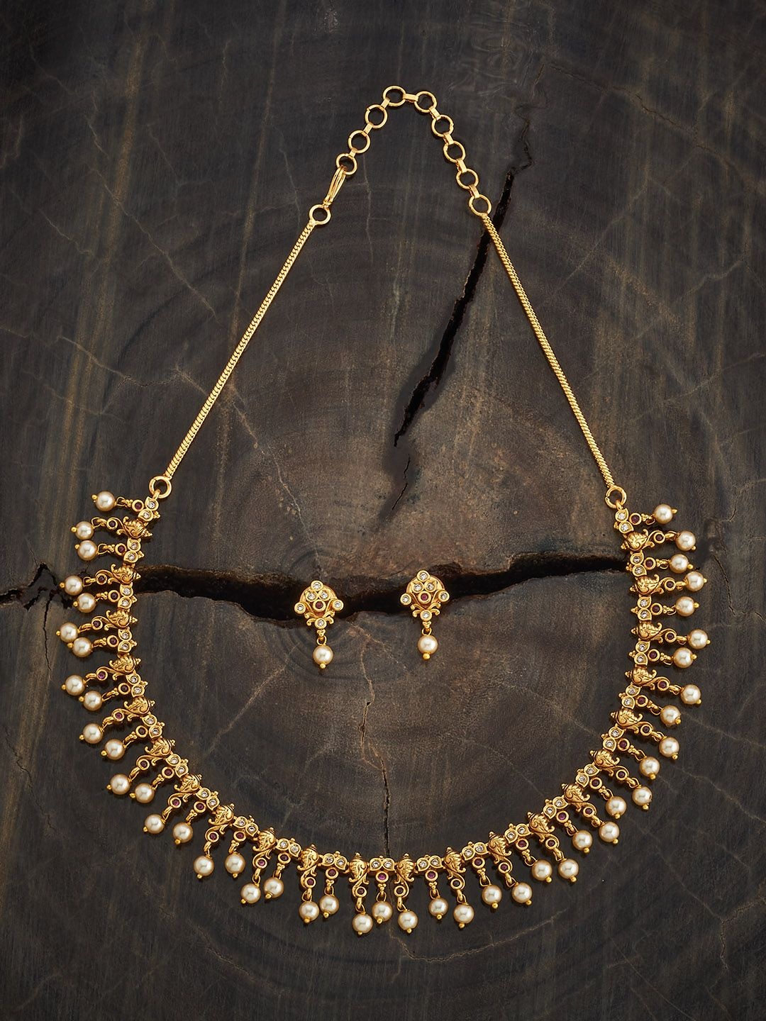 

Kushal's Fashion Jewellery Gold-Plated Ruby Studded Ethnic Antique Jewellery Set