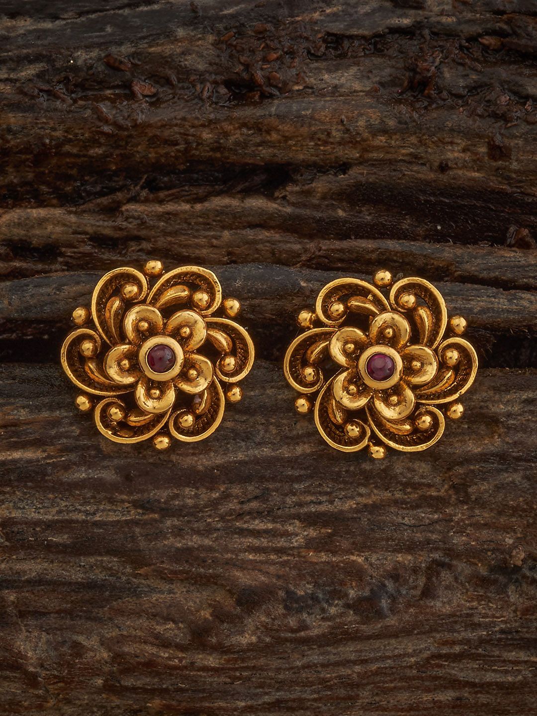

Kushal's Fashion Jewellery Gold Plated Ruby Studded Floral Shaped Studs Earrings