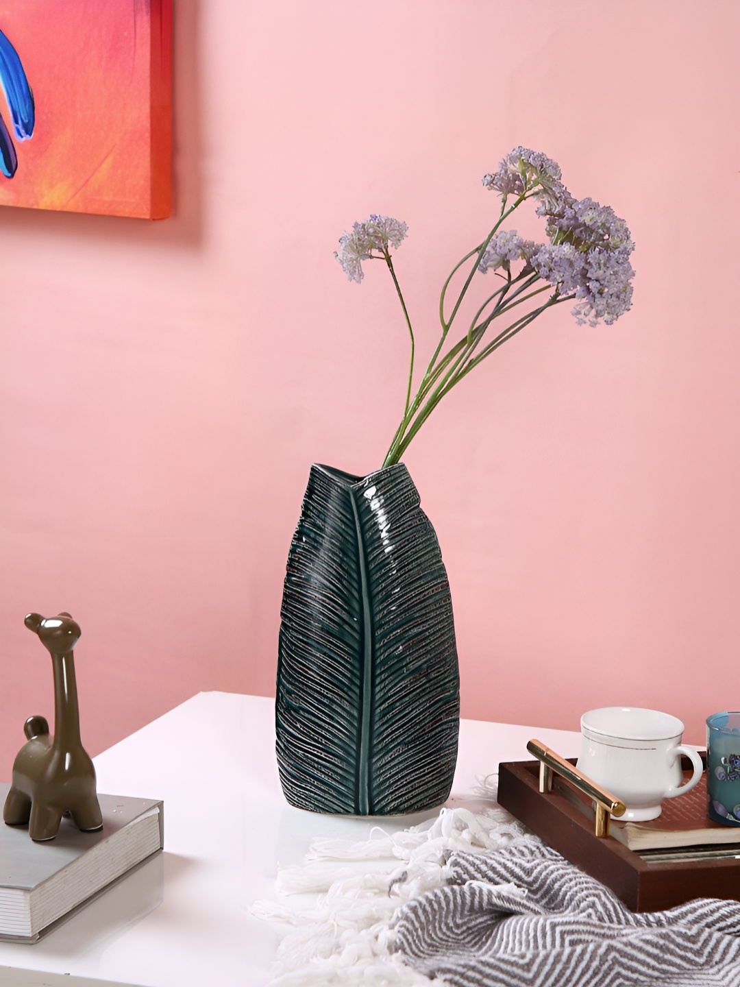 

Myntra Elegant Homes Green Leaf Textured Ceramic Vase