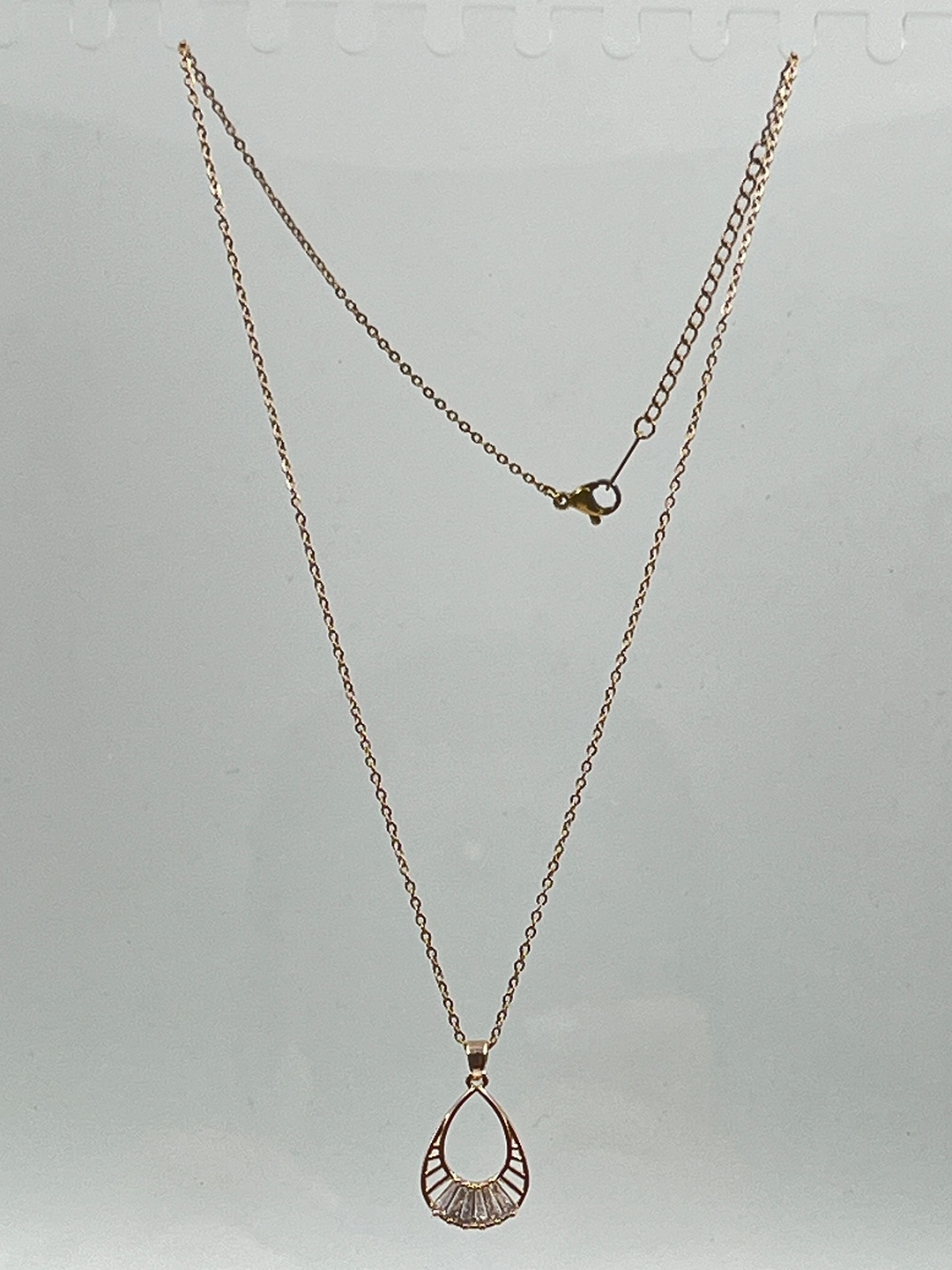 

DRAMATIC EFFECT Gold-Plated Stainless Steel Stone Studded Contemporary Pendant with Chain
