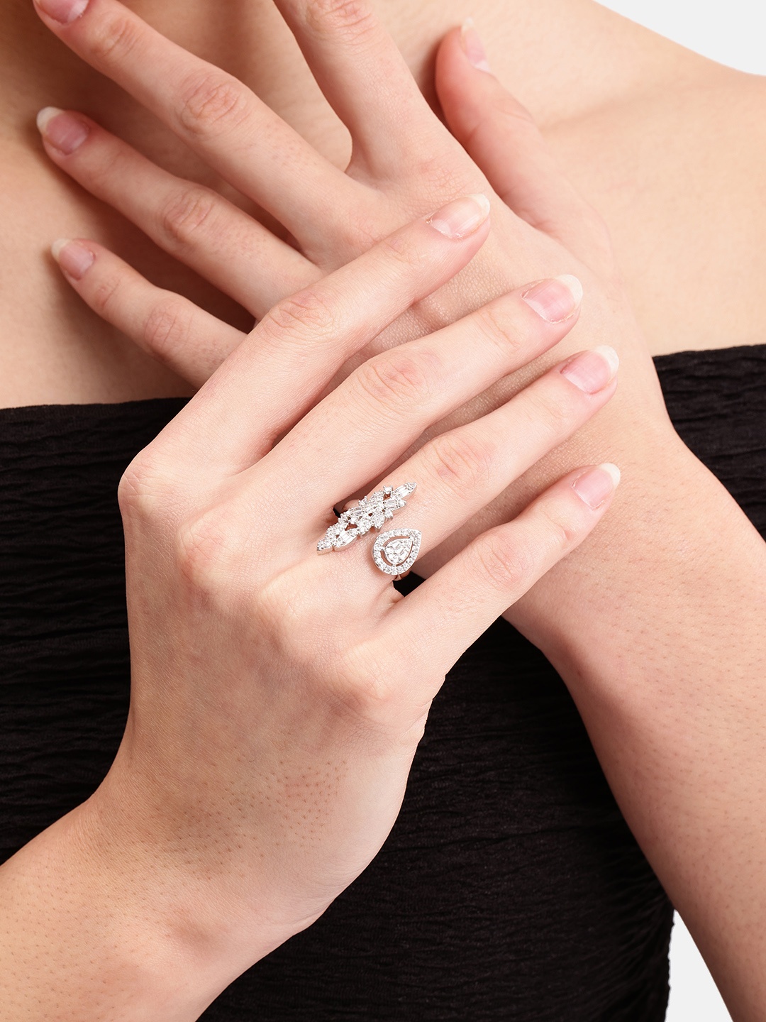 

DressBerry Women Stone-Studded Floral-Shaped Adjustable Finger Ring, Silver