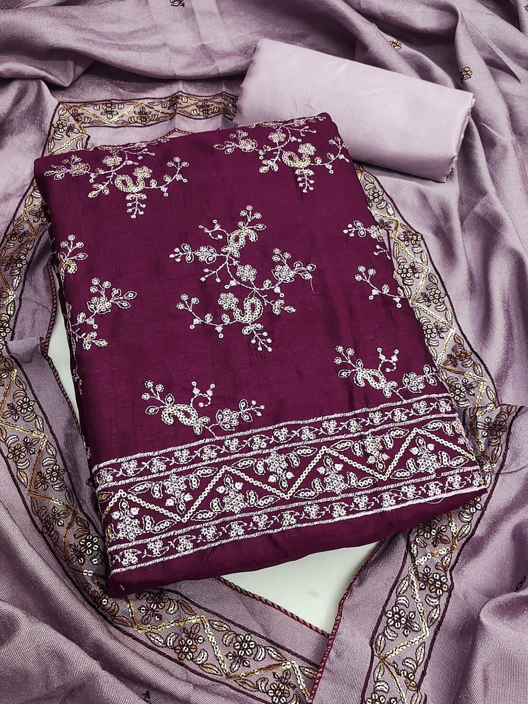 

BlissFlair Paisley Embroidered Sequinned Vichitra Silk Unstitched Dress Material, Purple