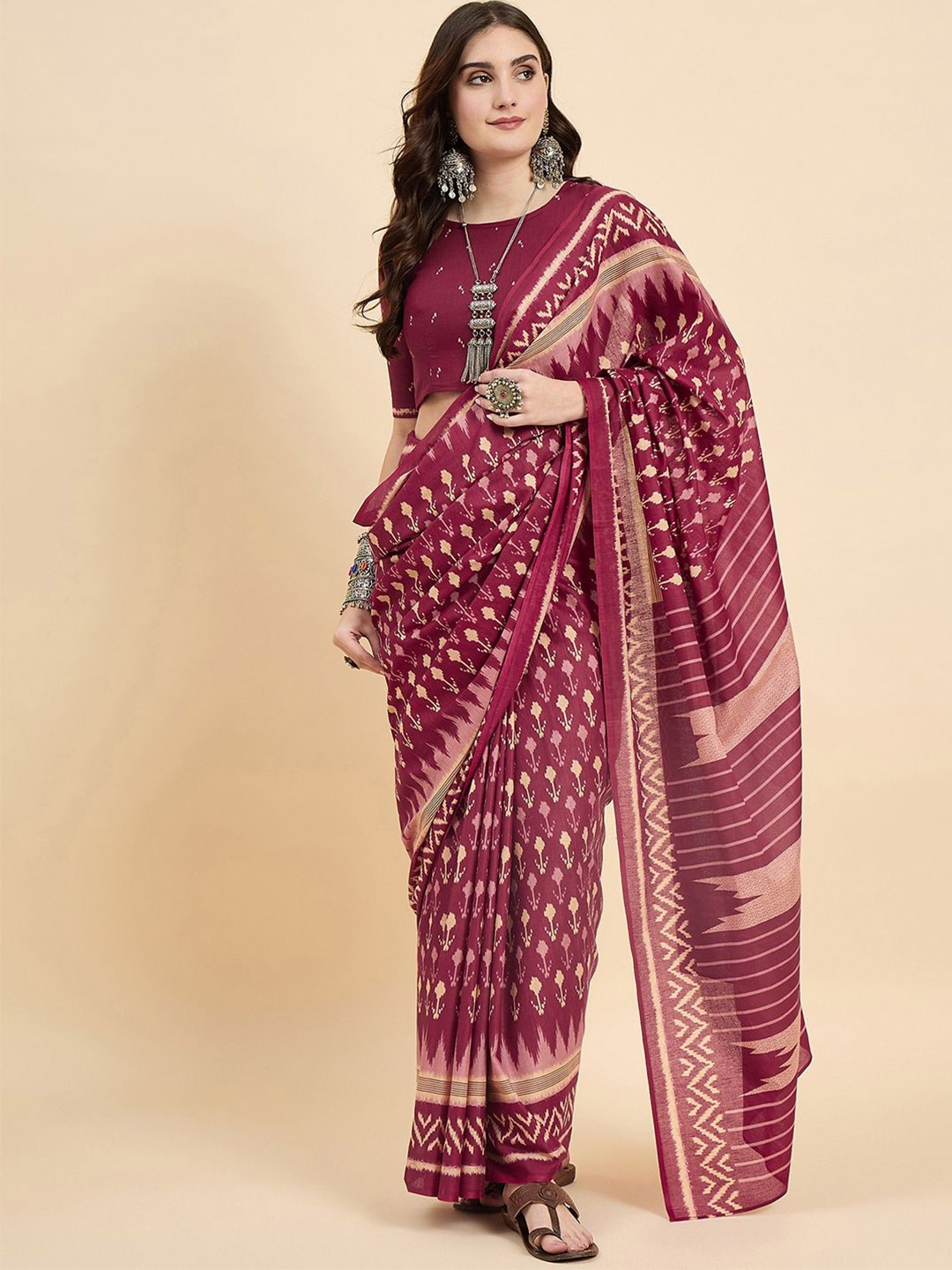 

Anouk Rustic Geometric Printed Ikat Saree With Unstitched Blouse Piece, Maroon