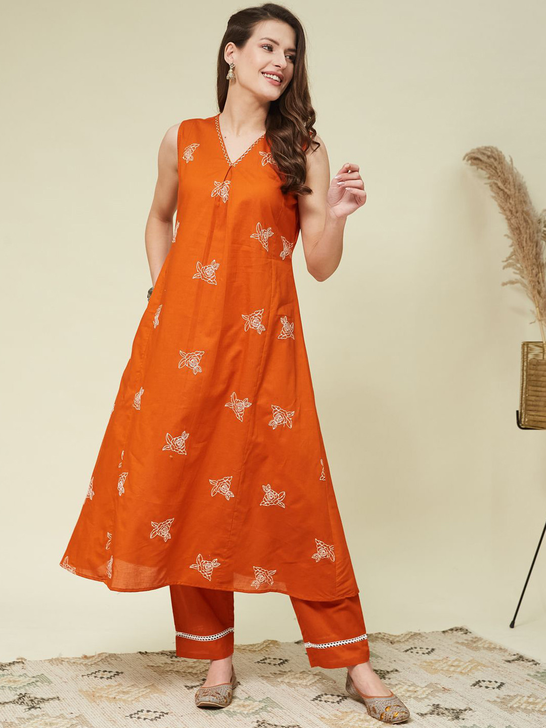 

MOKOSH Floral Embroidered V-Neck Pleated Thread Work A-Line Kurta With Trouser, Orange