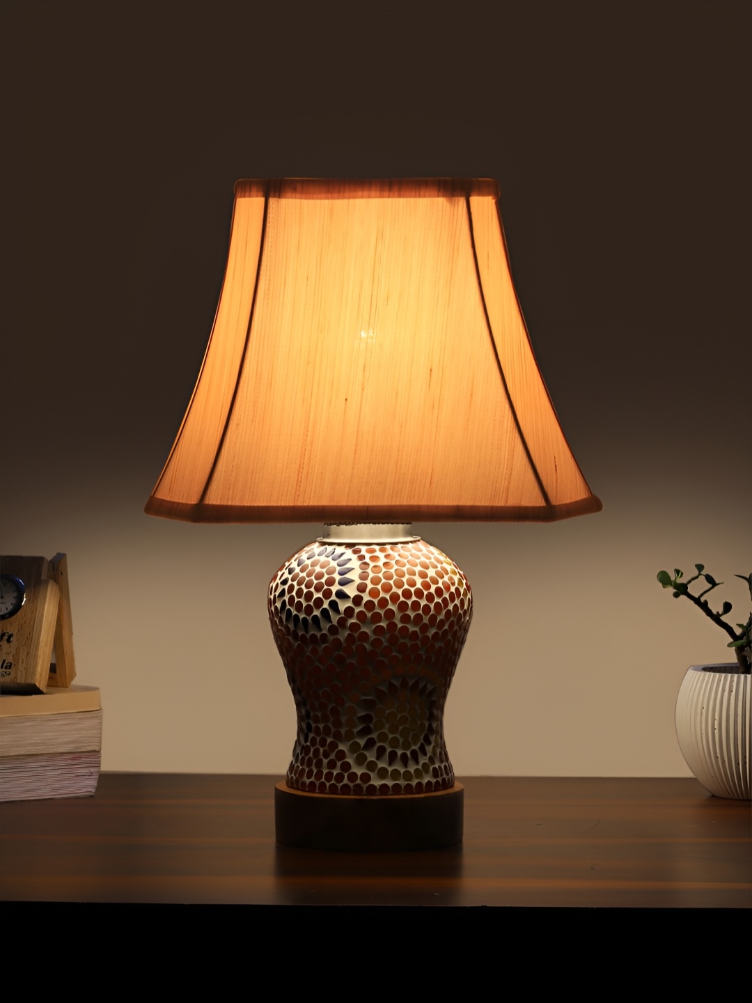 

Devansh Off White Textured Frustum Shaped Wooden Table Lamp