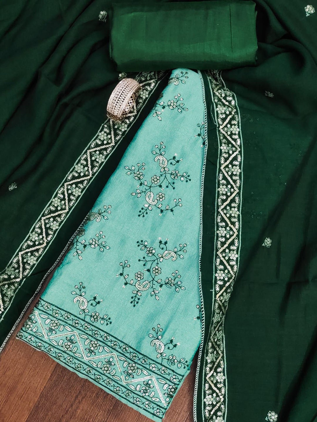 

BlissFlair Paisley Embroidered Sequinned Vichitra Silk Unstitched Dress Material, Sea green