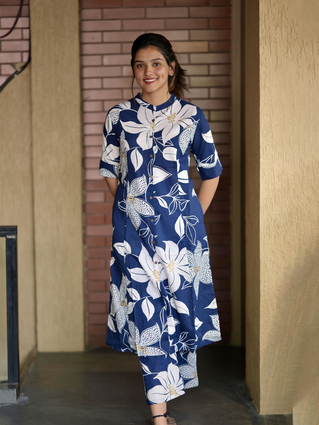 

Anni Designer Floral Printed Mandarin Collar A-Line Kurta With Palazzos, Blue