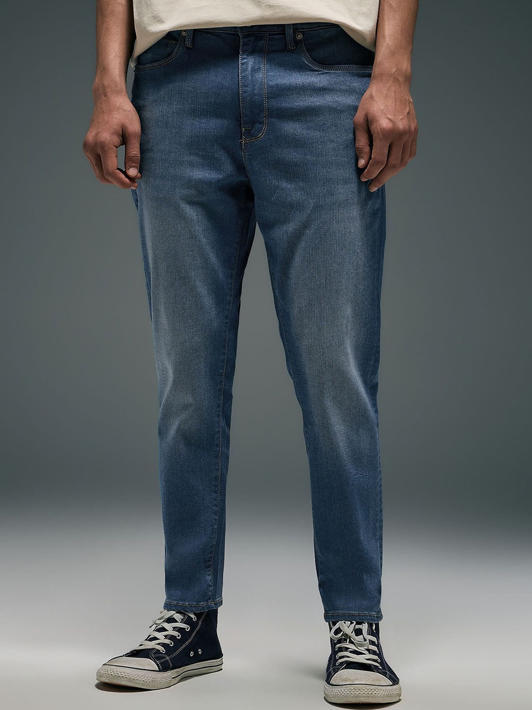

Flying Machine Men Relaxed Fit Mid Rise Light Fade Stretchable Jeans, Blue