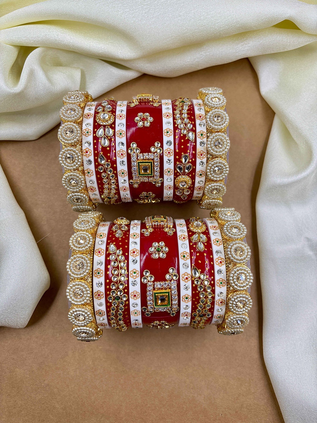 

Wedding Chuda by Hitesh Bangles Set Of 18 Gold-Plated Stones Studded & Beaded Bangles, Red