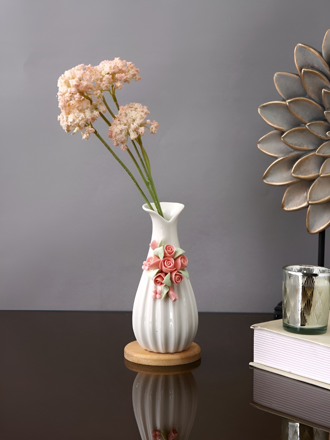 

Myntra Elegant Homes White & Pink Floral Textured Ceramic Vase