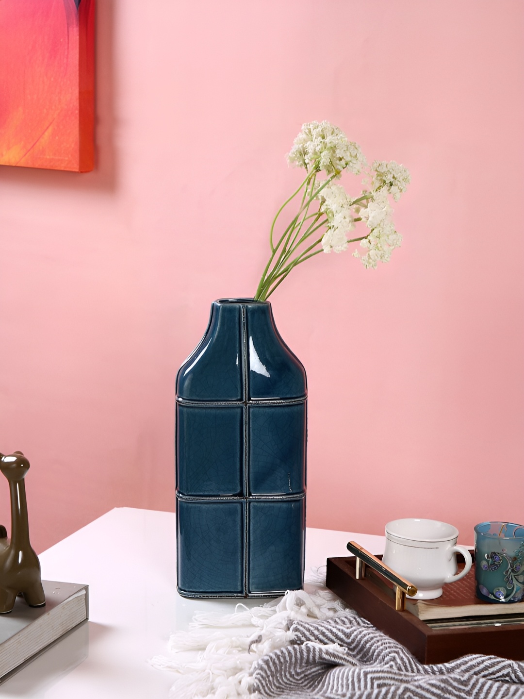 

Myntra Elegant Homes Navy Blue Textured Grid Ceramic Vase