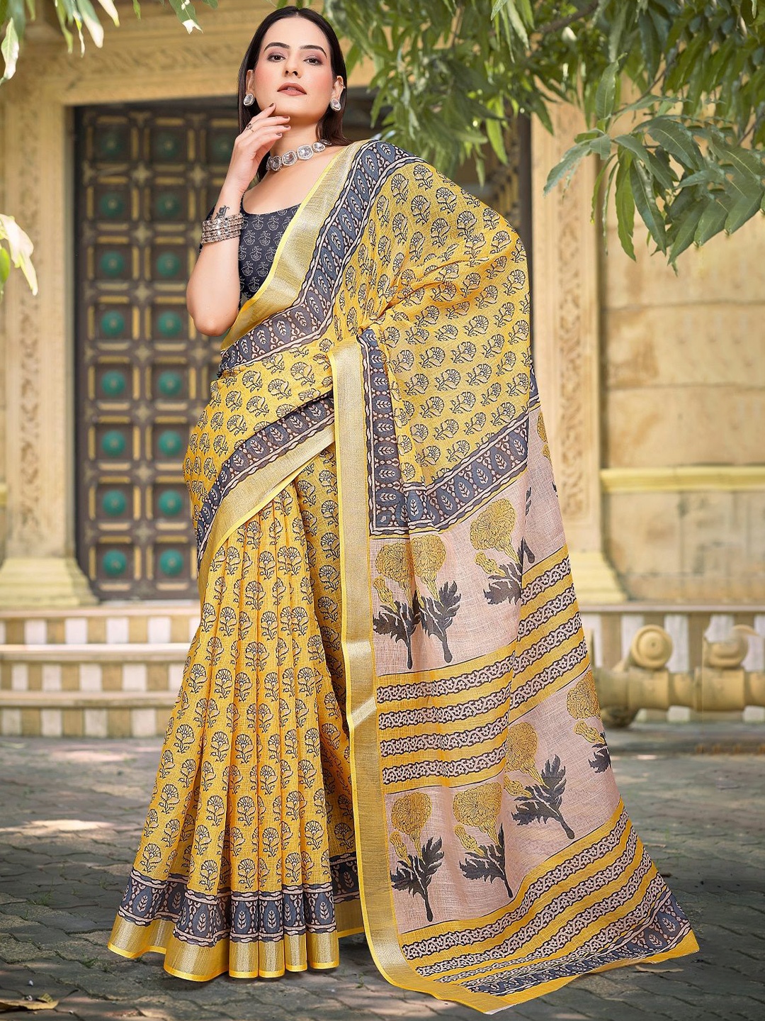 

Sarvada Floral Woven Zari Cotton Saree With Unstitched Blouse Piece, Mustard