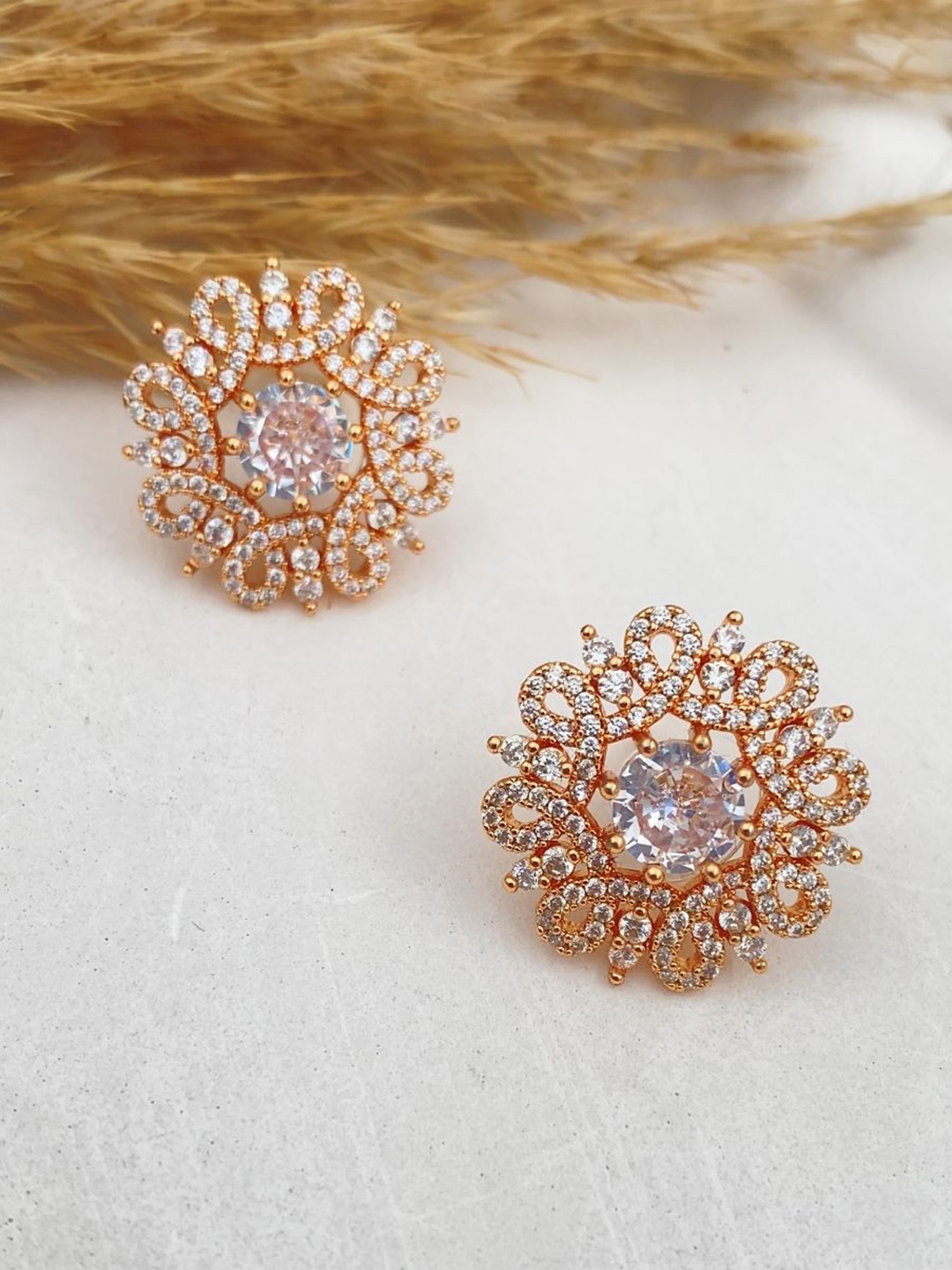 

Rare Bello Rose Gold-Plated American Diamond Studded Floral Shaped Studs
