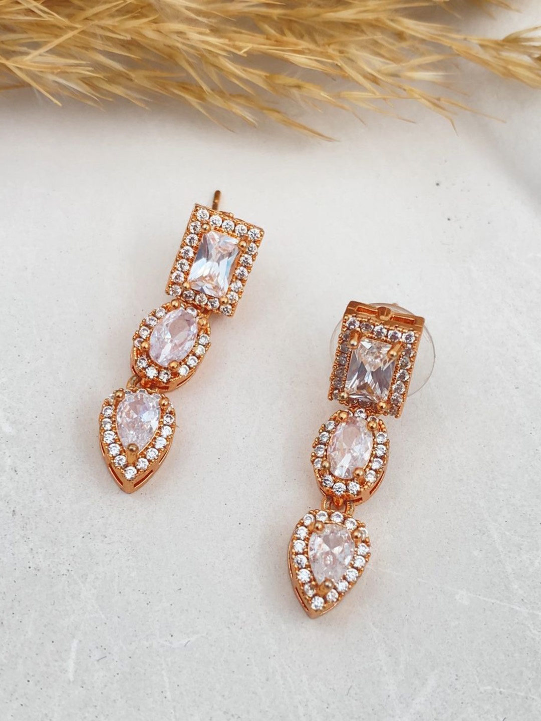 

Rare Bello Rose Gold-Plated American Diamond Studded Floral Shaped Drop Earrings