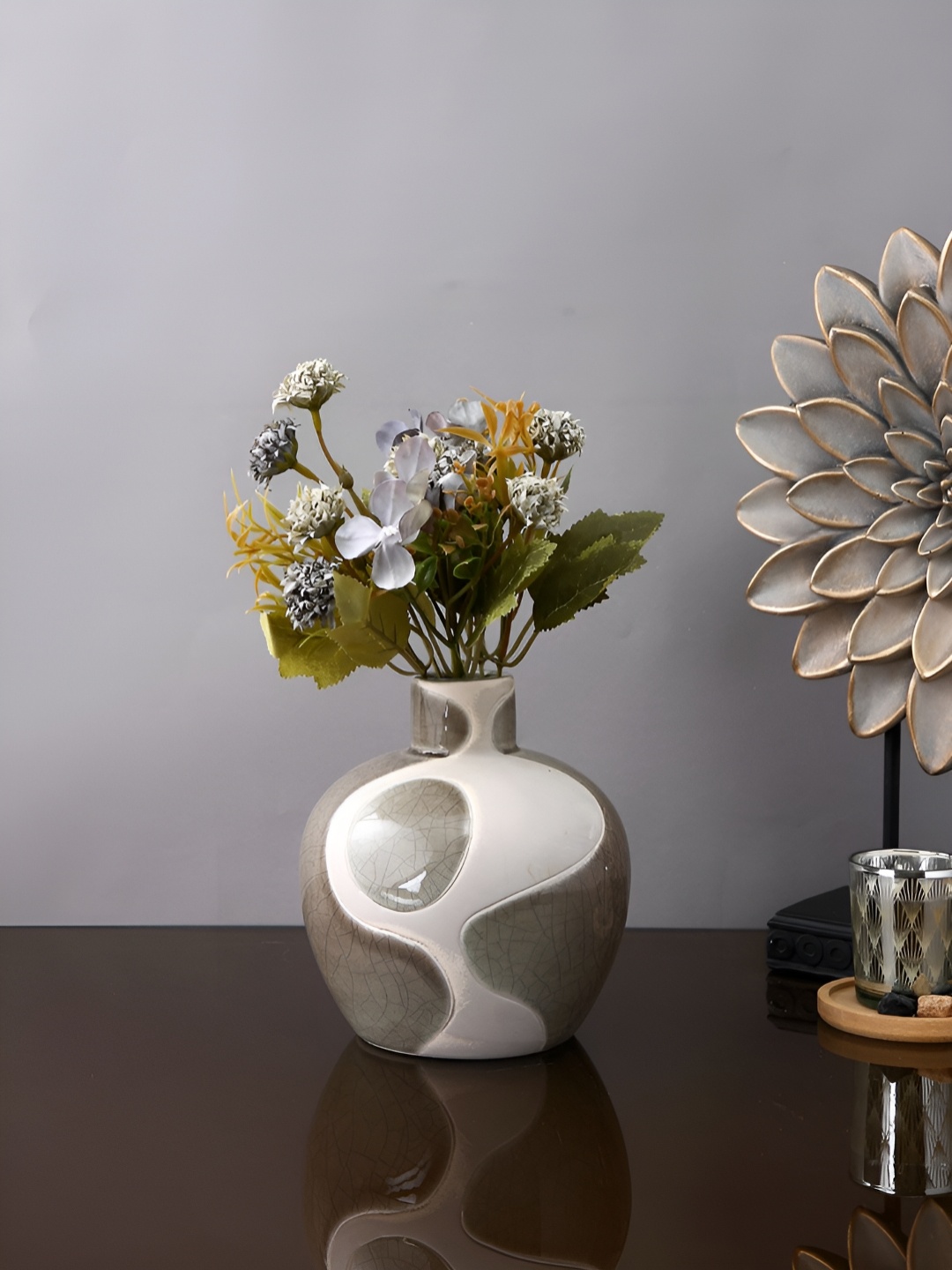 

Myntra Elegant Homes Grey & White Abstract Printed Ceramic Vase