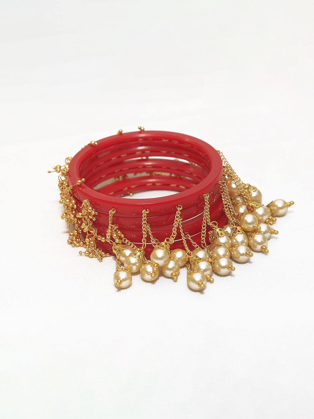 

Zindura Set Of 4 Gold-Plated Pearls Beaded Bangles