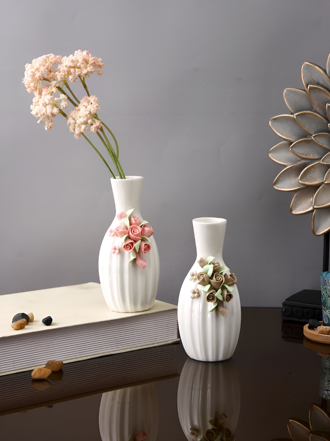 

Myntra Elegant Homes White & Beige 2 Pieces Floral Textured Ceramic Vases