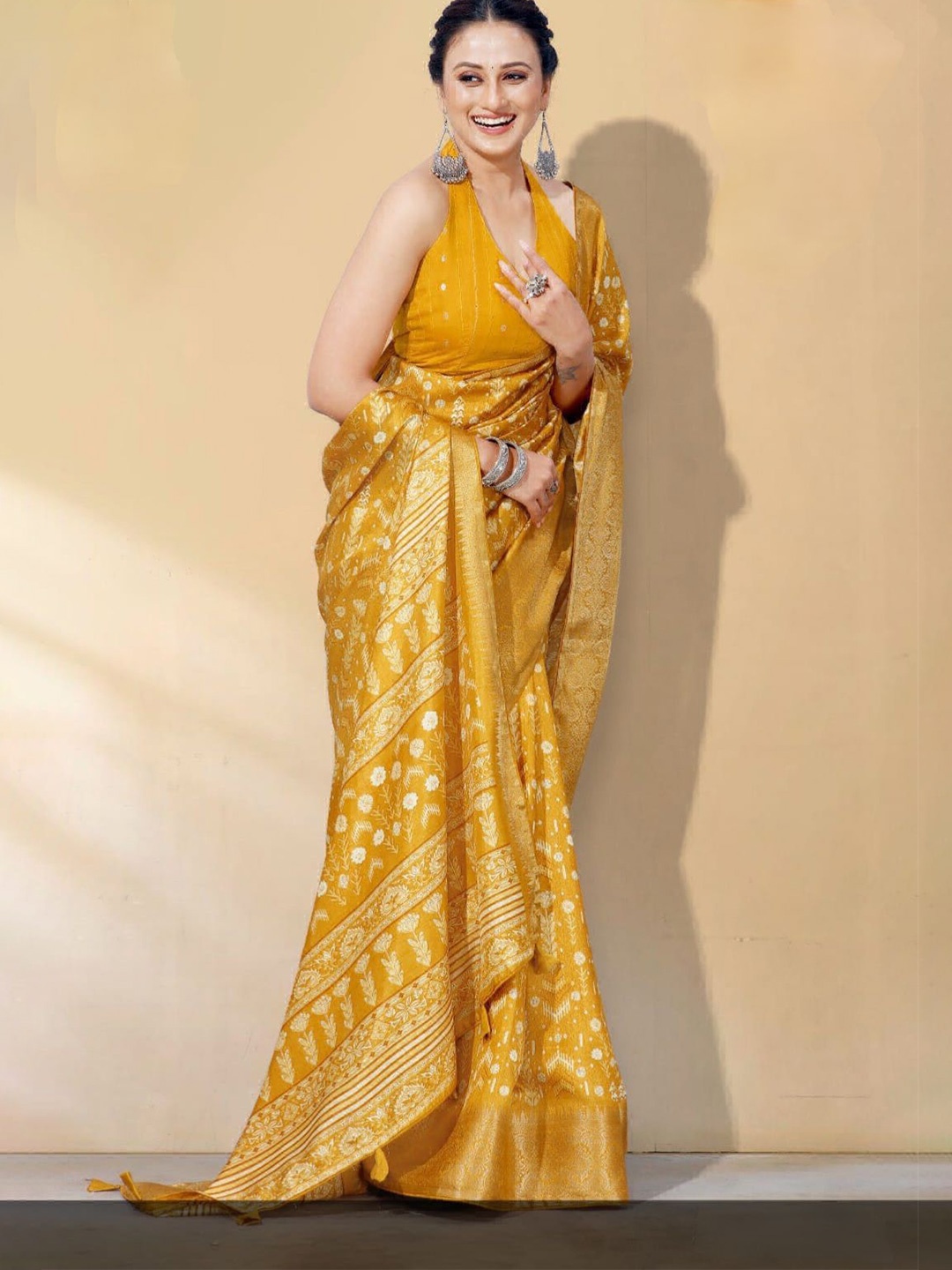 

Swaranjali Floral Printed Zari Muga Saree, Mustard