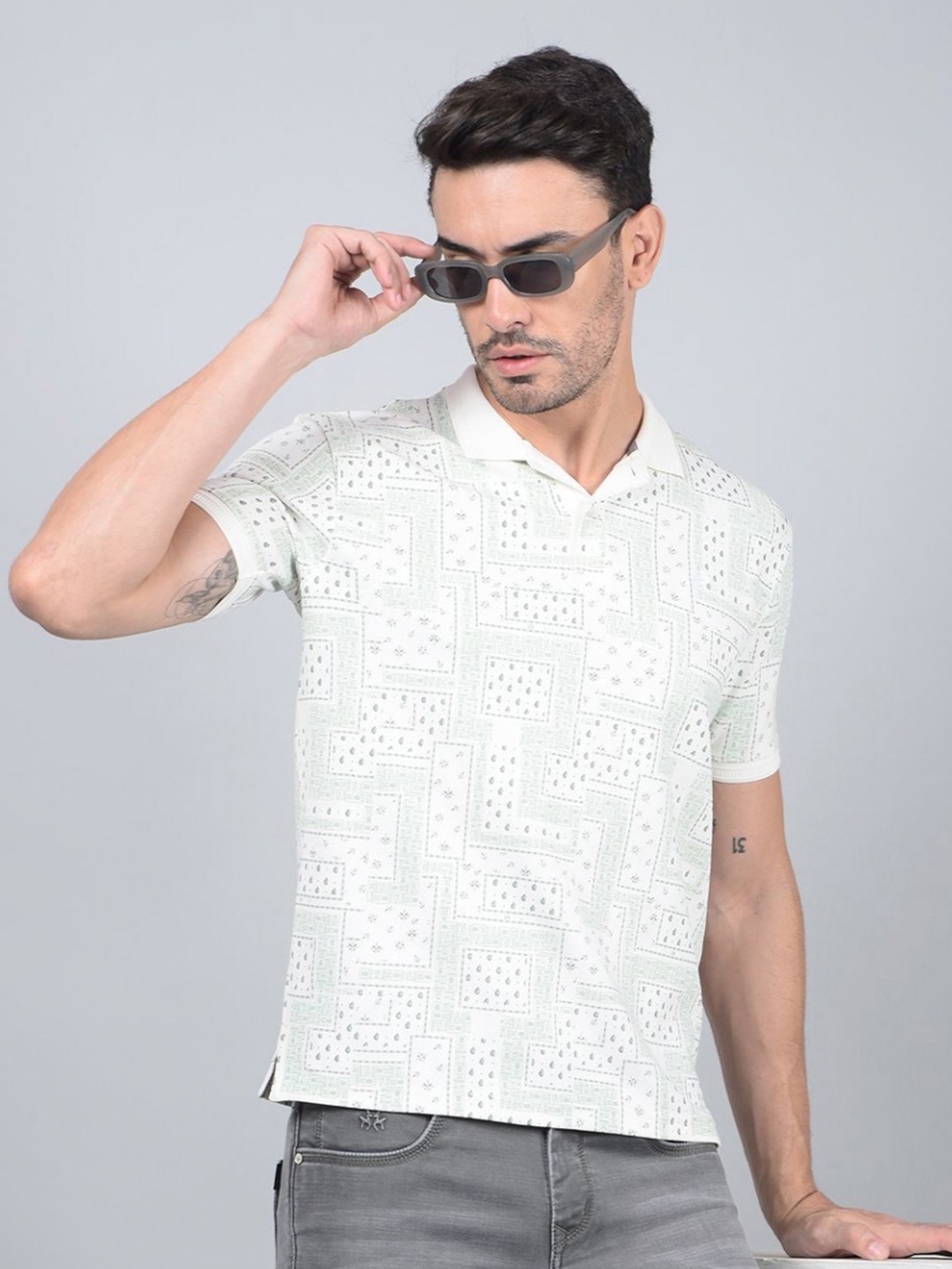 

Crimsoune Club Men Geometric Printed Polo Collar Cotton Slim Fit T-shirt, Blue