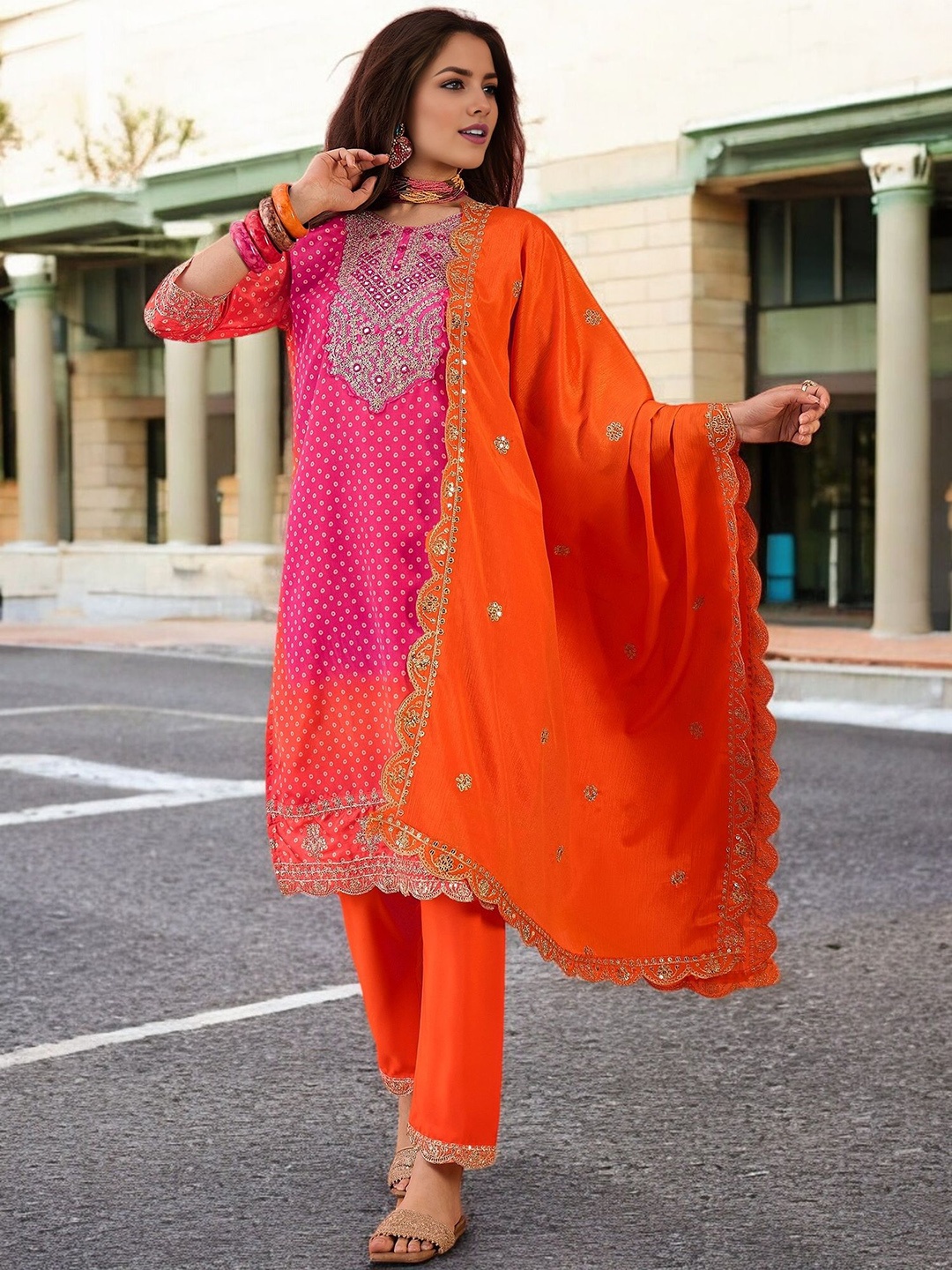 

KIMISHA Bandhani Printed Sequinned Round Neck Straight Kurta With Trousers And Dupatta, Magenta