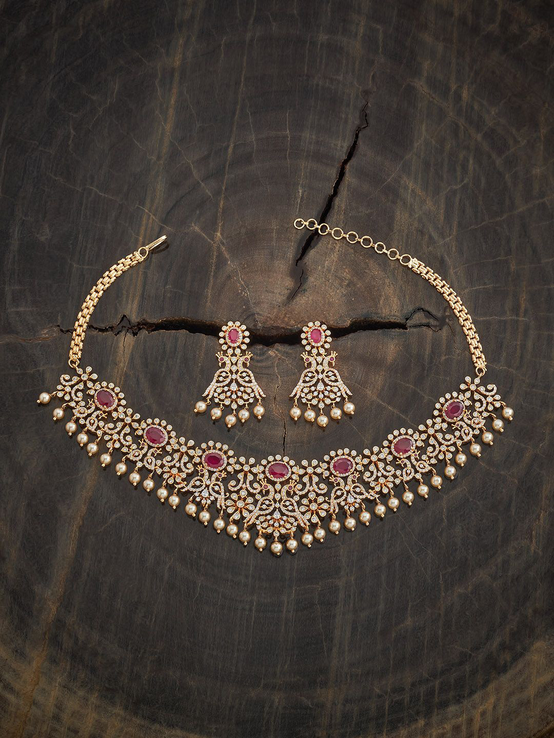 

Kushal's Fashion Jewellery Ruby Gold-Plated Zircon Studded Party Jewellery Set