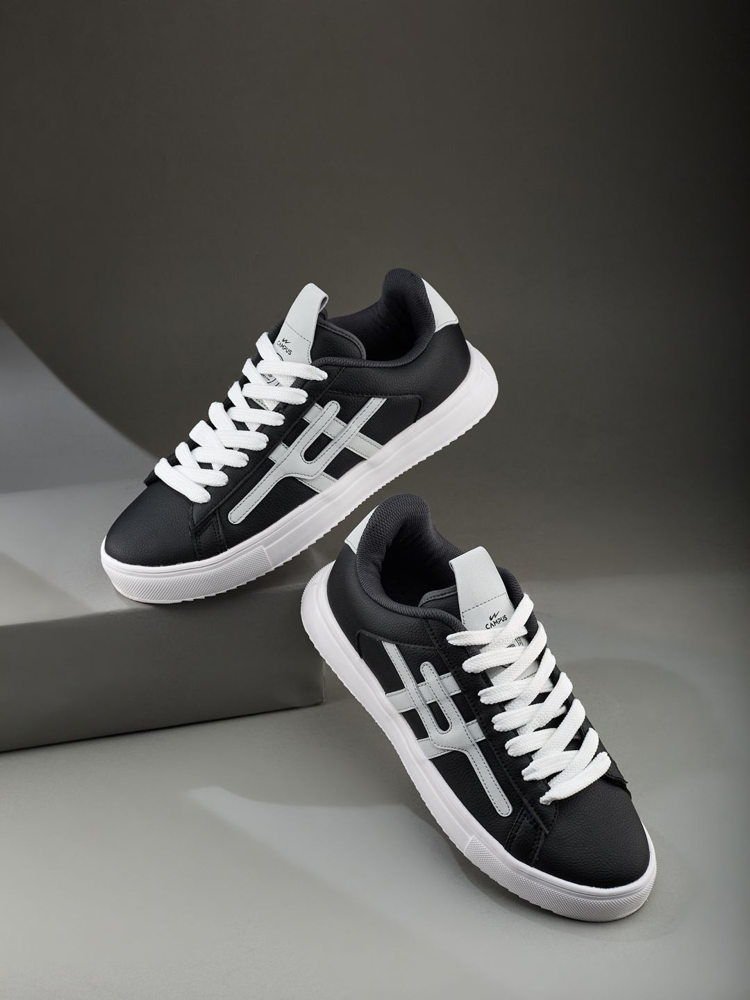 

Campus Men Printed Sneakers, Black