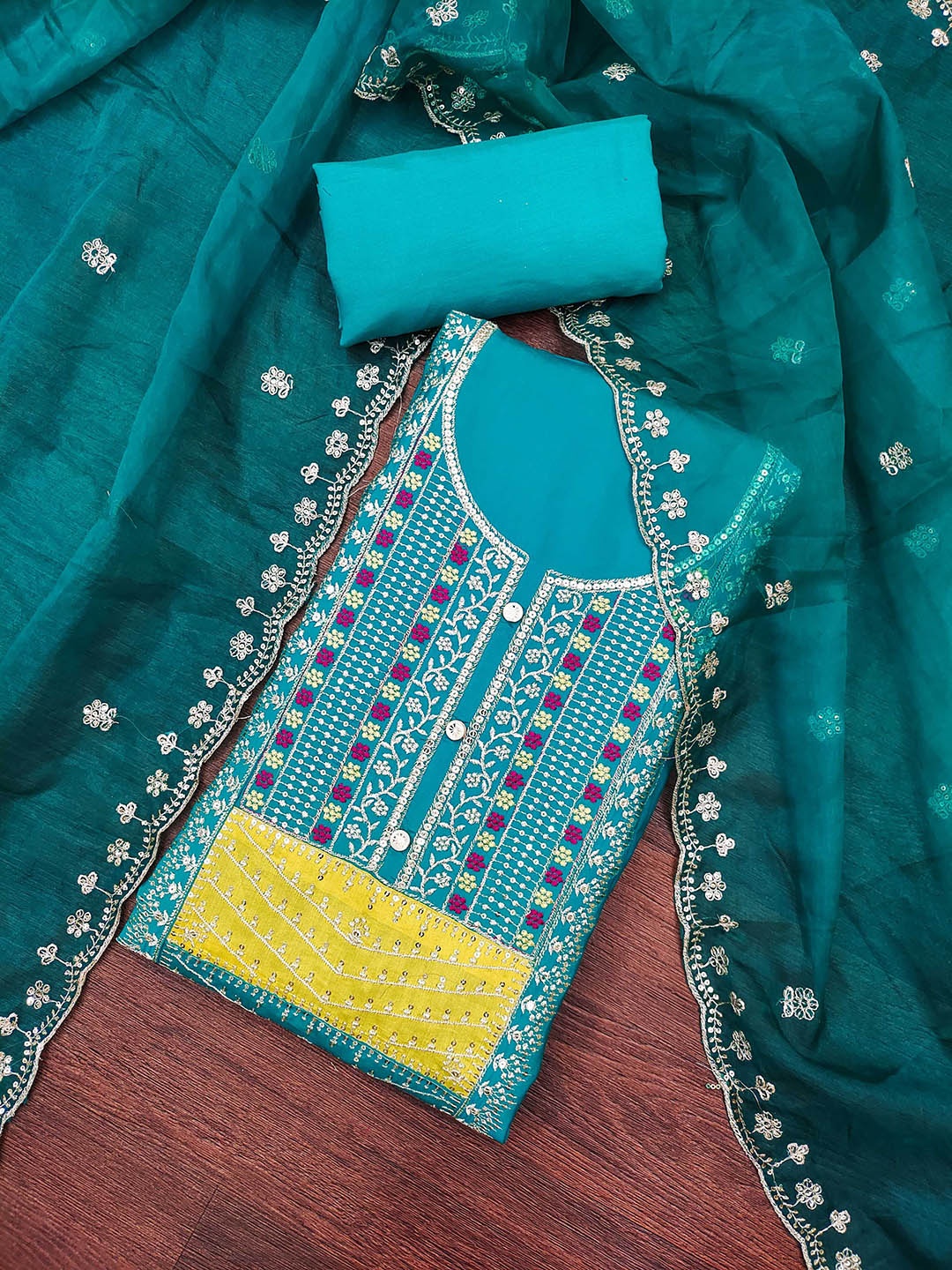 

SHADOW & SAINING Embroidered Sequinned Roman Cotton Silk Semi-Stitched Dress Material, Teal