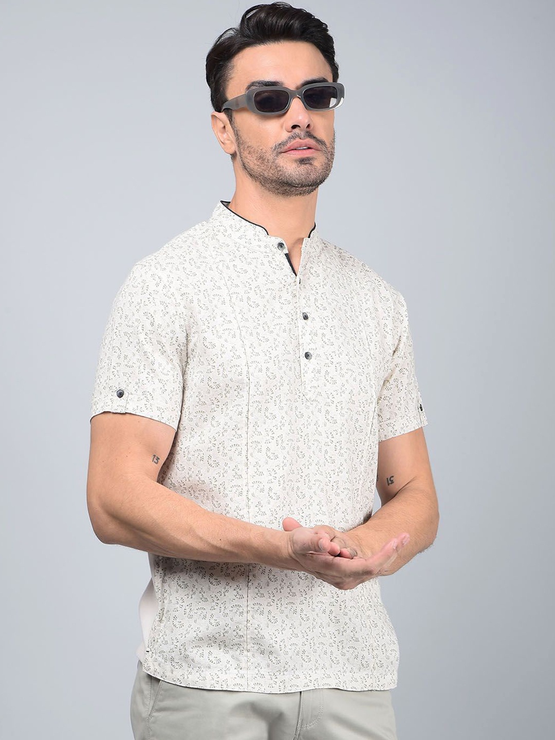 

Crimsoune Club Men Abstract Printed Band Collar Pure Cotton A-Line Kurta, Beige
