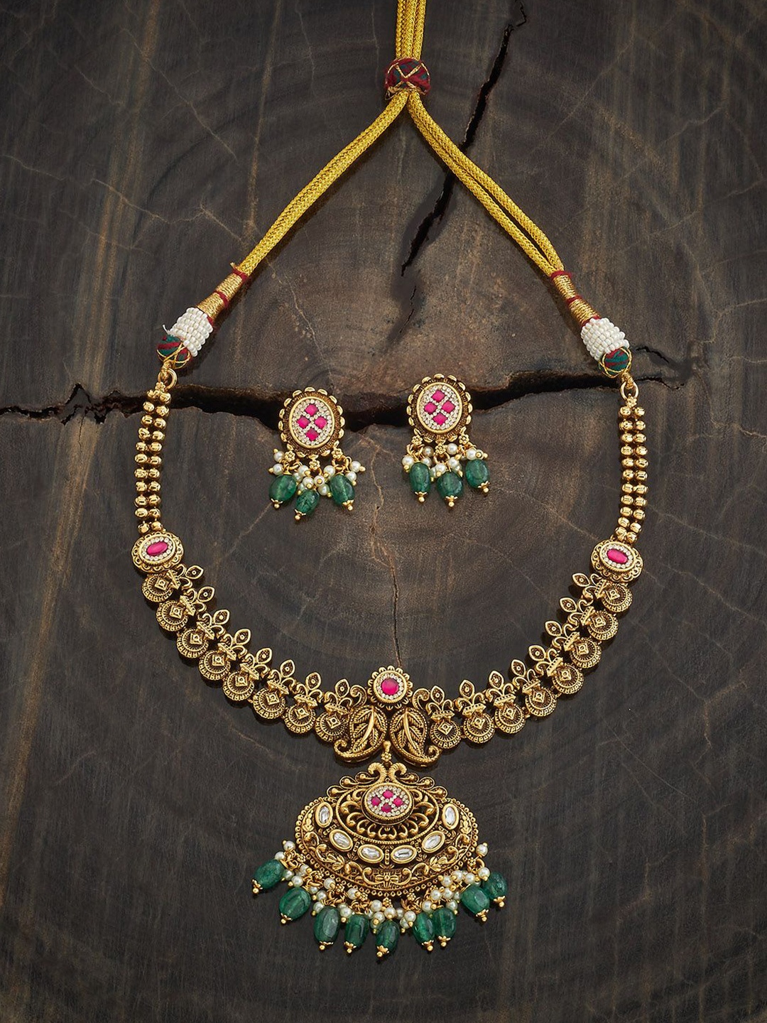 

Kushal's Fashion Jewellery Gold-Plated Ruby Studded Ethnic Antique Jewellery Set