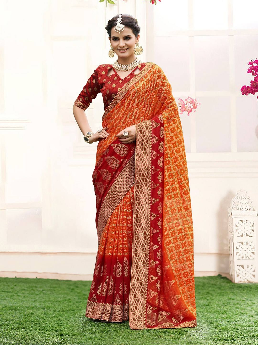 

Rekha Maniyar Zari Pure Georgette Bandhani Saree, Orange