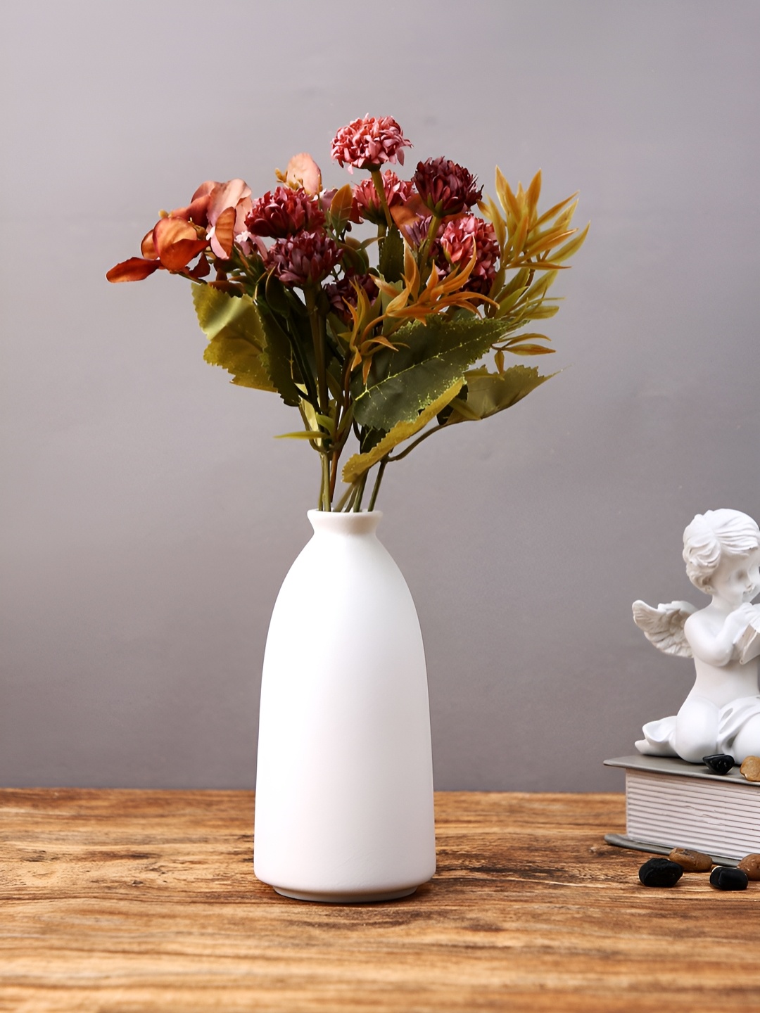 

Myntra Elegant Homes White Matte Ceramic Bottle Shaped Flower Vase