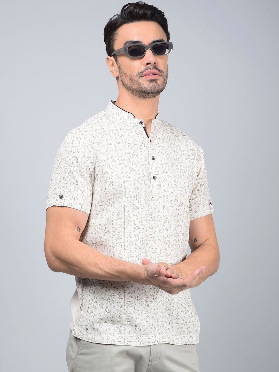 

Crimsoune Club Men Abstract Printed Band Collar Pure Cotton A-Line Kurta, Beige