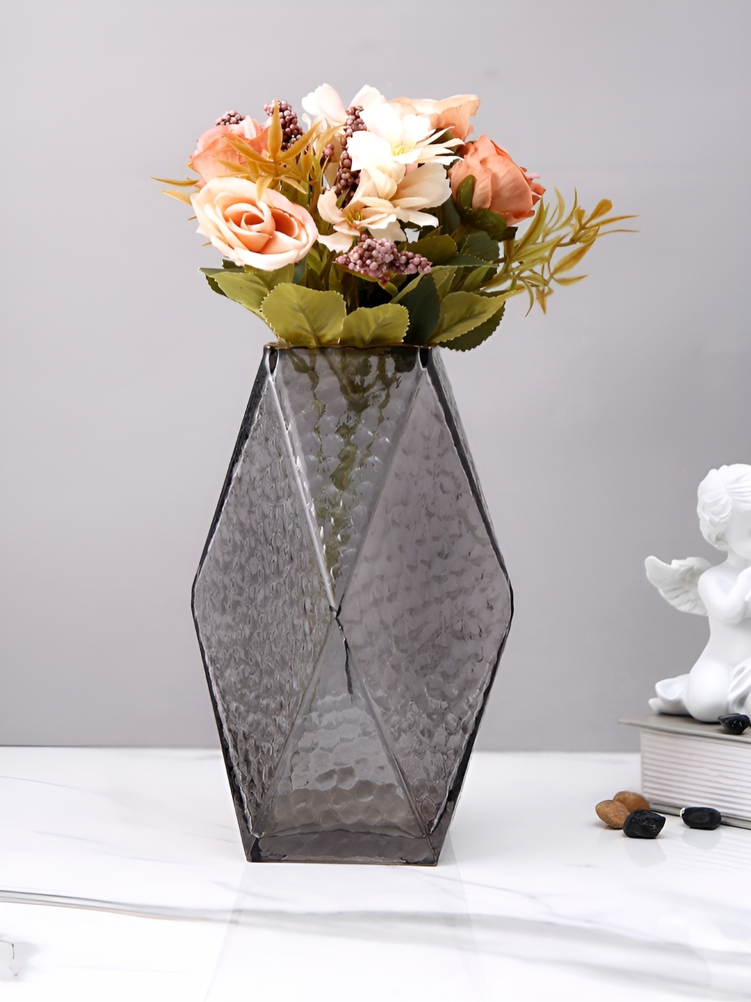 

Myntra Elegant Homes Black Textured Glass Geometric Shaped Flower Vase