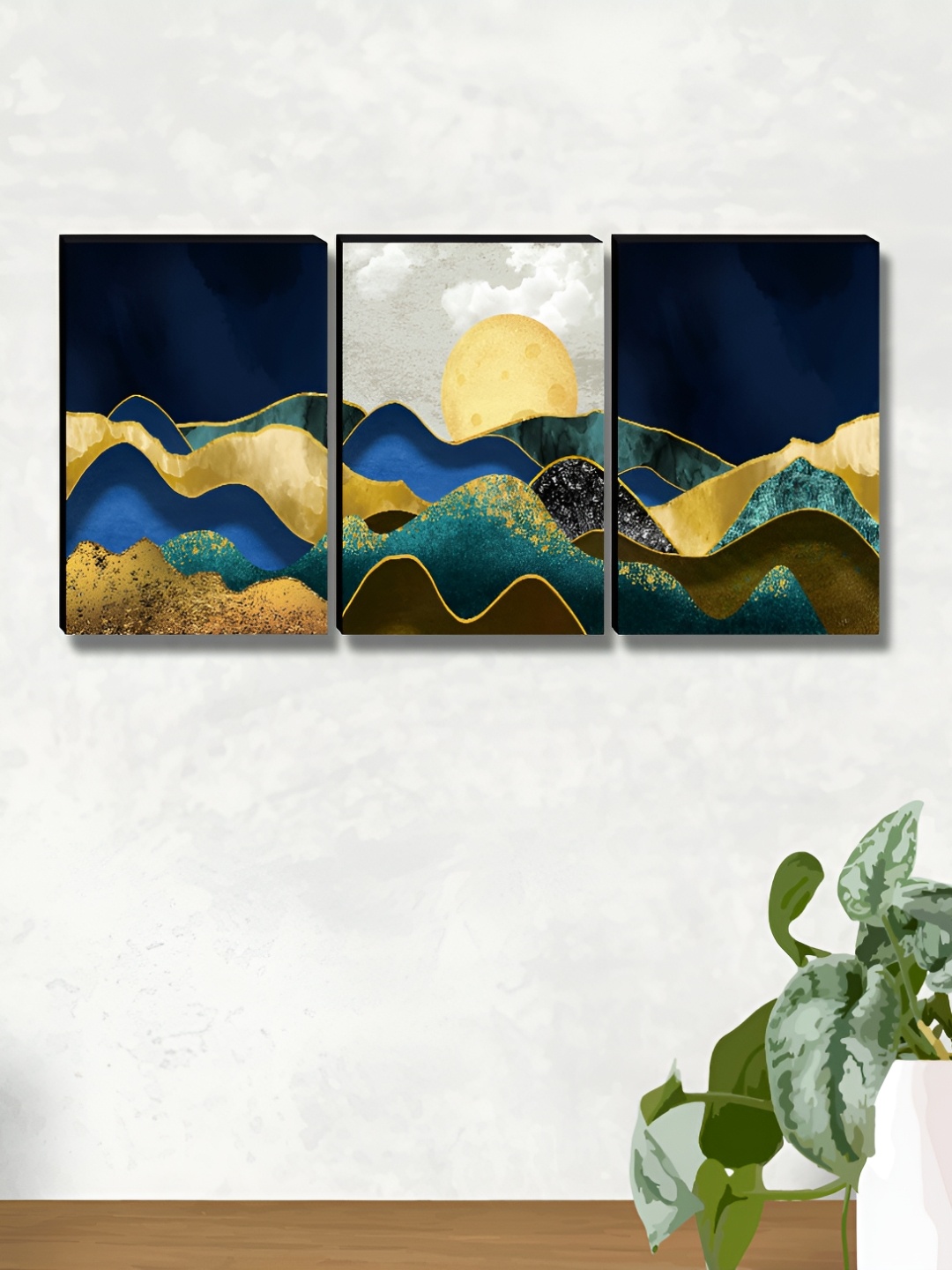 

Myntra Elegant Homes Gold-Toned & Navy Blue 3 Pieces Abstract Wall Arts