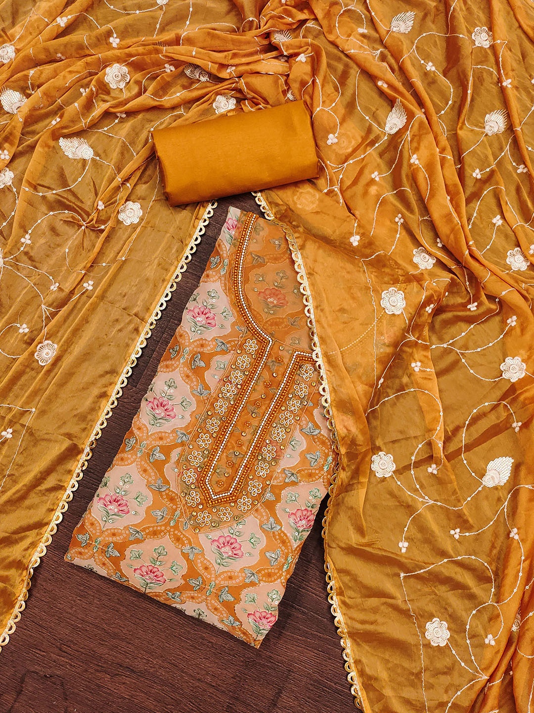 

SHADOW & SAINING Floral Embellished Beads and Stones Organza Semi-Stitched Dress Material, Mustard