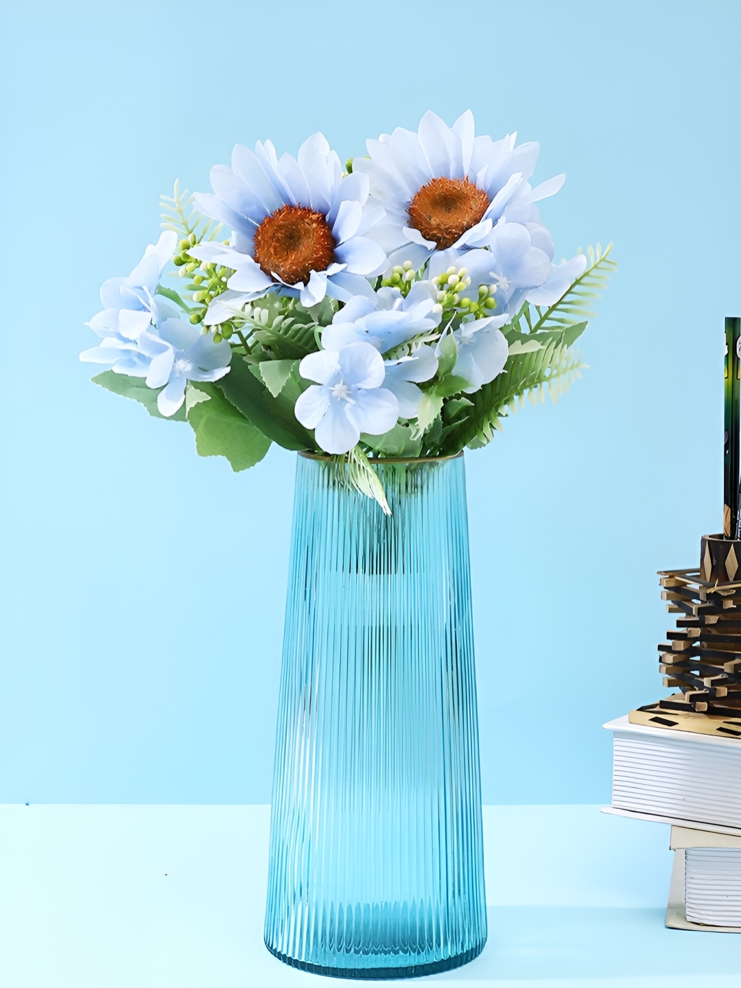 

Myntra Elegant Homes Aqua-Blue Skyline-Striped Glass Flower Vase